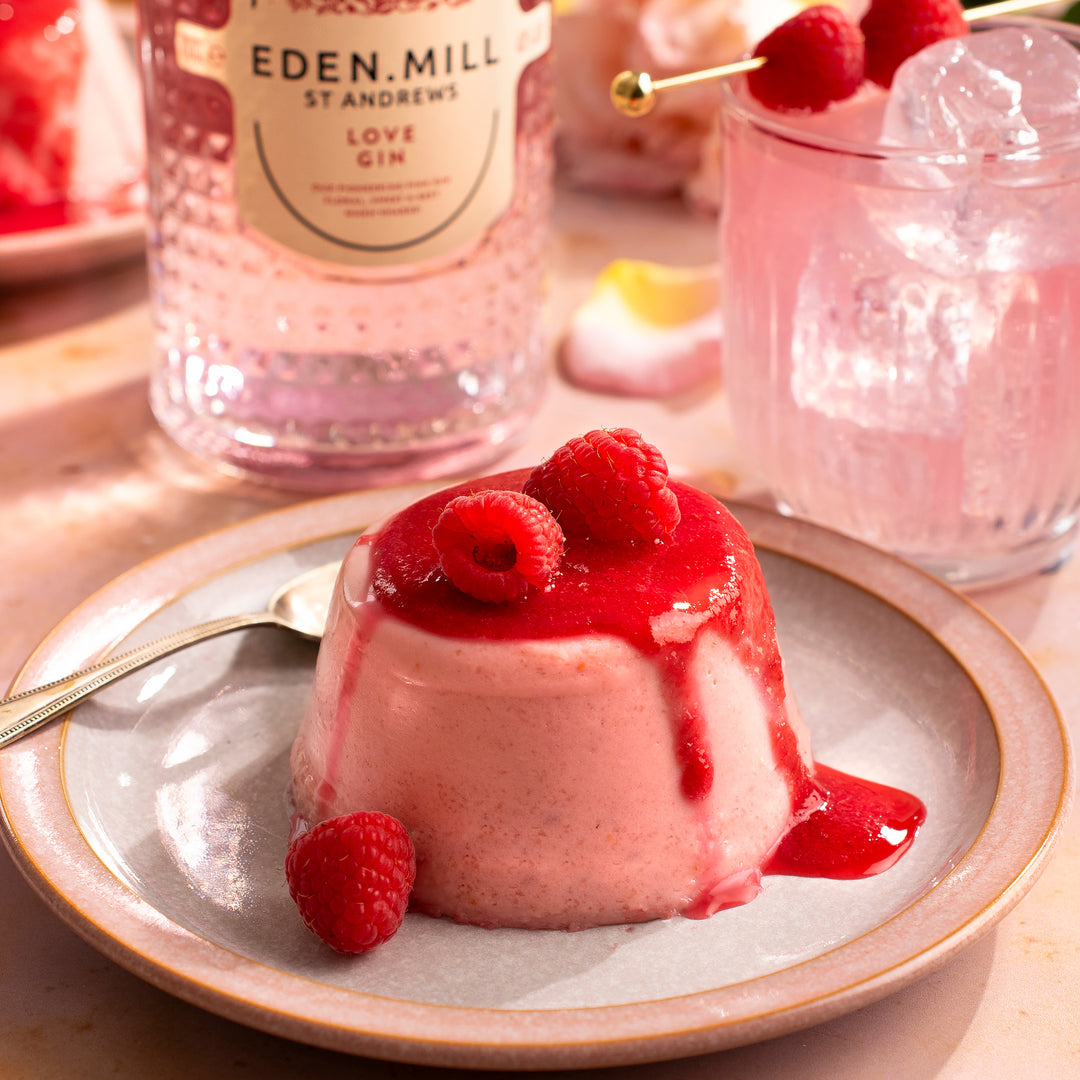 Boozy Raspberry Panna Cottas with Spiked Raspberry Sauce | Made with Love Gin