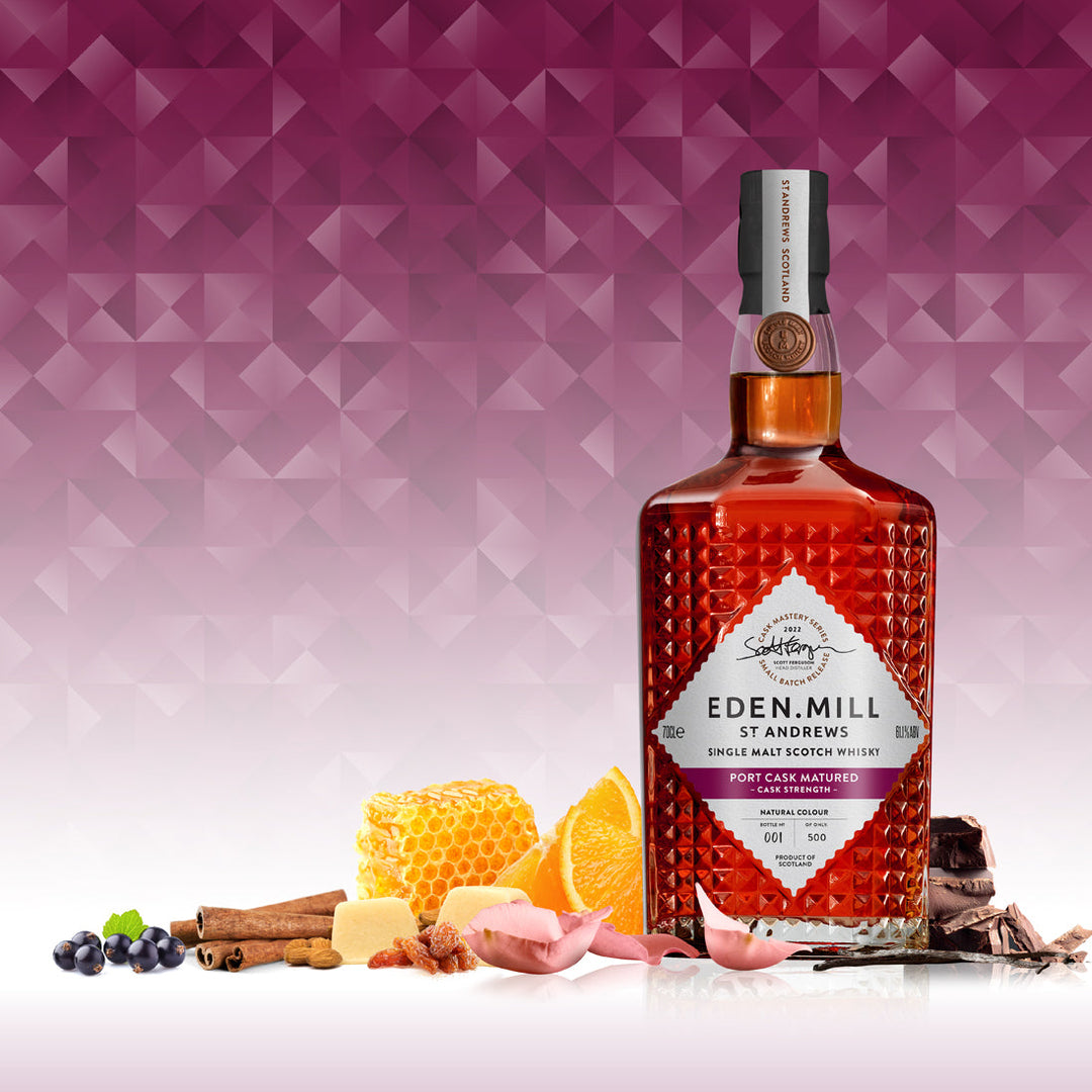 Port Cask Single Malt Whisky Bottle on purple abstract background with images of honey and fruit and chocolate around base of bottle